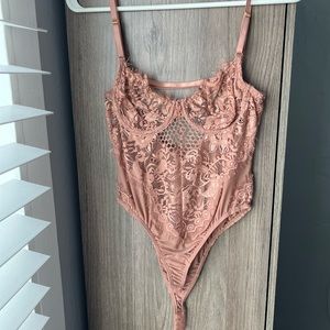 Rose gold lace body suit